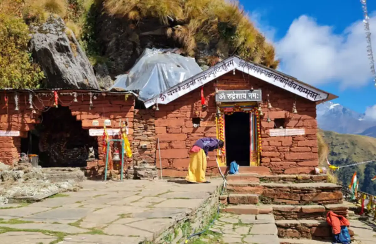"Ancient Panch Kedar temple in Uttarakhand nestled in the Himalayas with snow-covered peaks and spiritual ambiance."